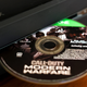An Xbox One devours a Call of Duty disc.